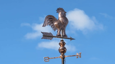 My Chicken Run Weather Vane Is On Fire In The Sun on Make a GIF