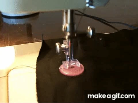 Sewing a Button with a Sewing Machine on Make a GIF
