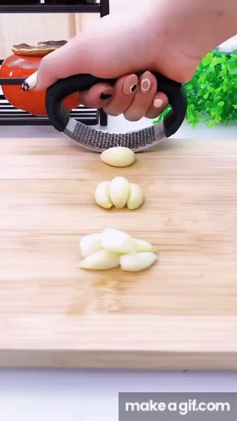 Triturador de Alho Manual Em inox on Make a GIF