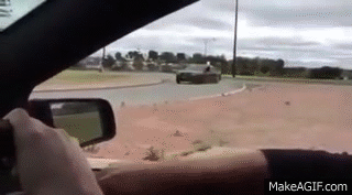 holden-ss-ute-huge-drift-at-roundabout-on-make-a-gif