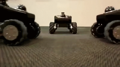 Robotnik Summit XL OMNI robots driving around a ball gif