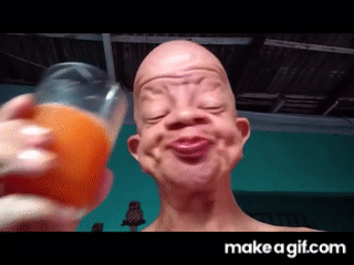 Old man drinks orange juice on Make a GIF