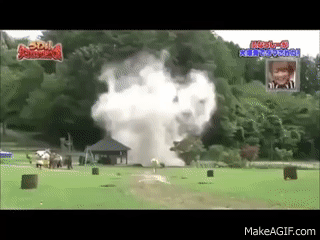 japanese game show character runs from explosions gif