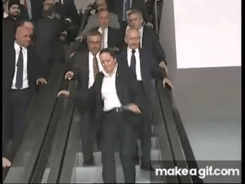 keMAL Kılıçdaroğlu yürüyen merdivene ters biniyor HQ on Make a GIF