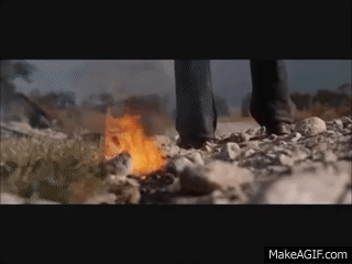 walking away from explosion gif