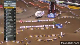 Tyler Bowers Boots Zach Osborne for the lead in Heat 2 at Anaheim 1 - 2015 Supercross width=