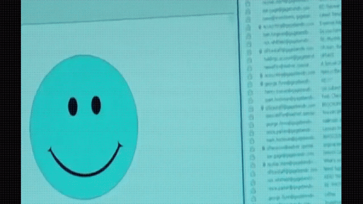 moving winking smiley face gif