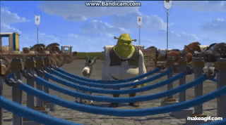 The scene in Shrek where the Farquaad mascot runs back and forth through an admission queue, while Shrek walks straight through, knocking over the velvet ropes.