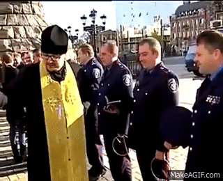 Svestenik osvestava Policajce :)) on Make a GIF