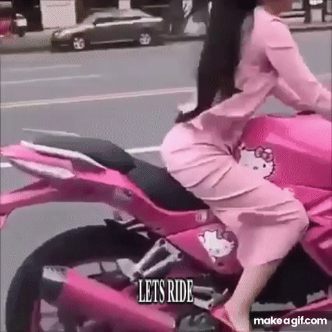 girlie riding hello kitty pink motorcycle to Vroom Vroom by CharliXCX