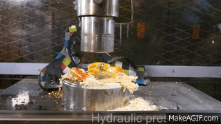 Crushing huge pile of Australian stuff with hydraulic press on Make a GIF