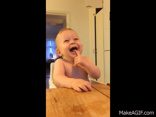 woman laughing hysterically gif