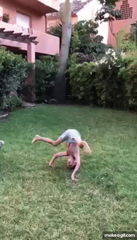 Boy doing headstand gets kneed in the balls by girl on Make a GIF.