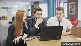 Three business people meeting in office on Make a GIF