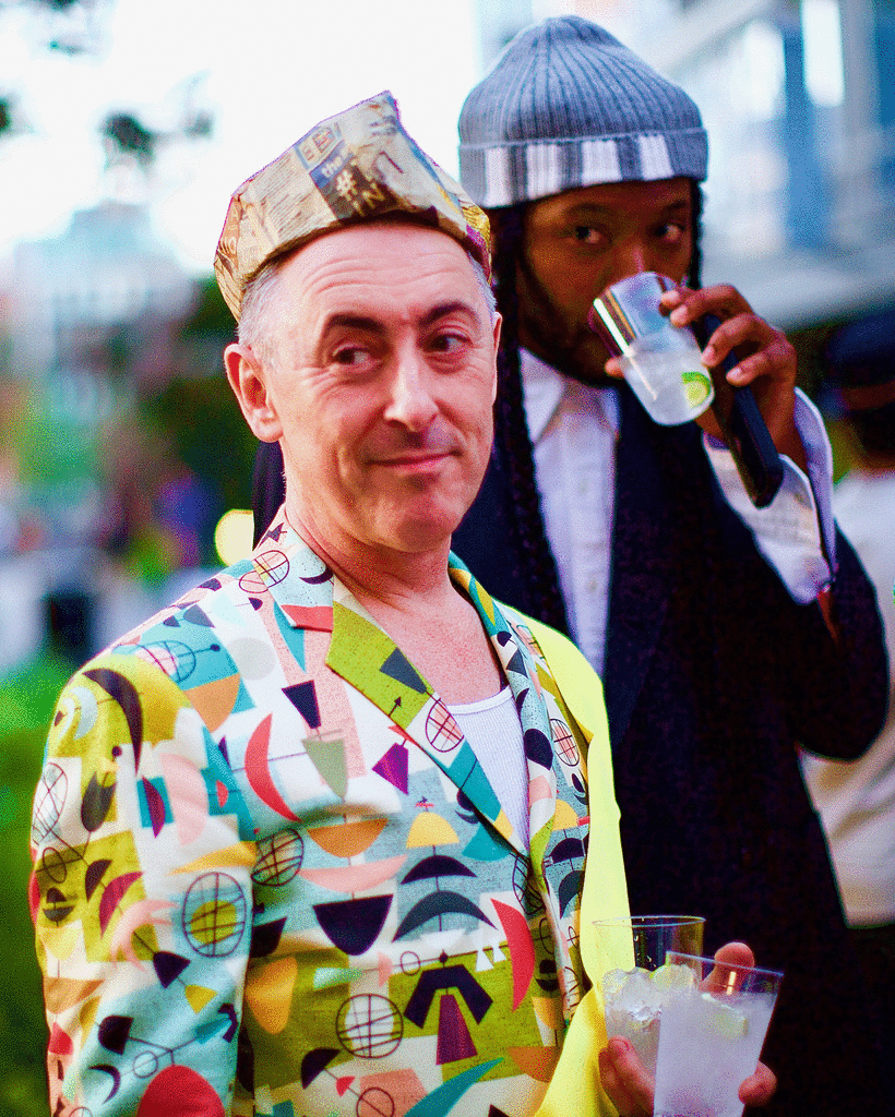 Alan Cumming Checking Out A Hottie at the High Line Hat Party on Make a GIF