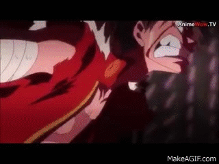 A powerful punch landing on a person's face, captured mid-action with visible force.