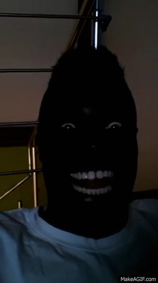 Black Man Laughing in the Dark on Make a GIF