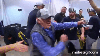 Bob Uecker celebrates with the Brewers